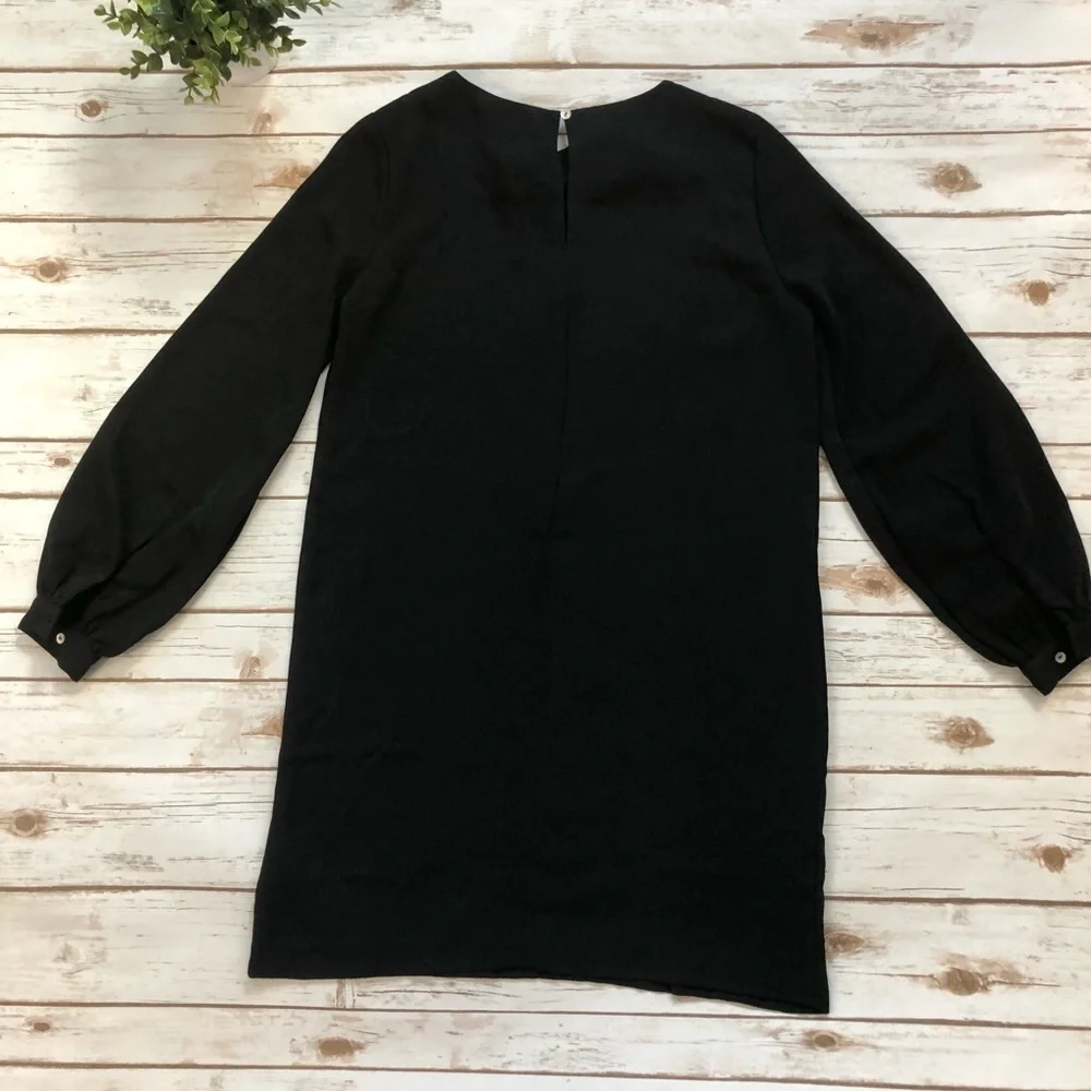Reyna Couture black blousant sleeve dress
